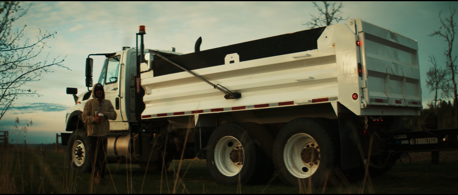 Amped Up Contracting dump truck on a job site in Red Deer County